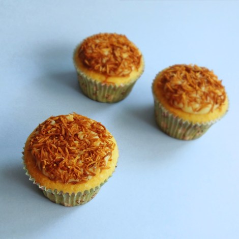 the best vanilla cupcakes ever with coconut brigadeiro filling and frosting